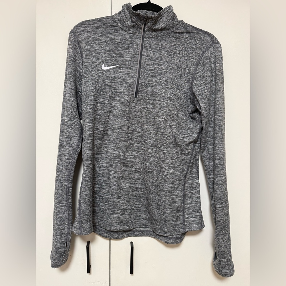 Woman’s Nike Grey Heathered Dri-FIT 1/4 Zip Pull Over
